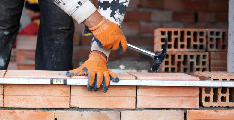 London Builder Laying Bricks